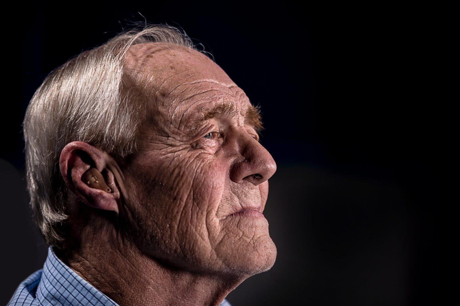 old man elderly hearing aid